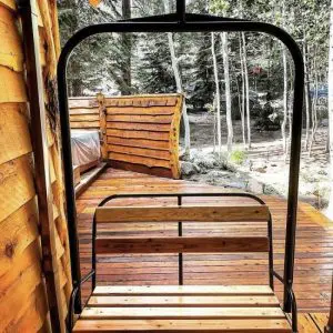 Outdoor metal ski lift hanging bench