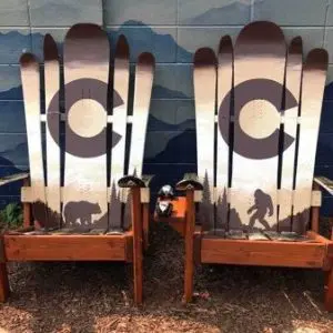 Brown bear and Bigfoot Adirondack hybrid ski/snowboard chairs