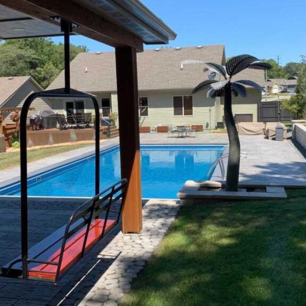 Outdoor metal ski lift hanging bench