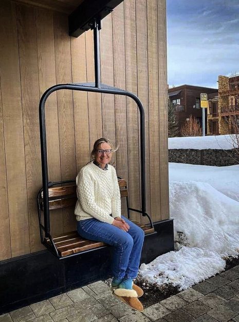 Outdoor metal ski lift hanging bench