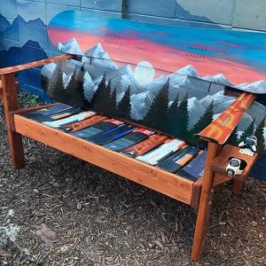 Sunset mountain mural Colorado snowboard bench