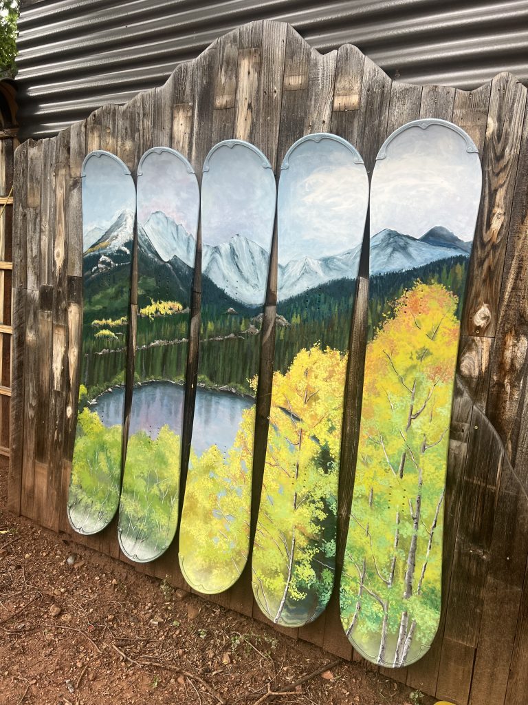 Hand painted mountain lake wall mural on reclaimed wood