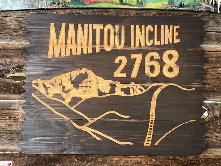 Manitou Incline 2768 wall art on walnut stained planks showing the mountain and its step ladder