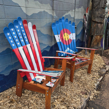 USA and Colorado Flag Ski Chair Pair, Angled View Stars and stripes ski chair beside a Colorado flag ski chair on a redwood stained Douglas Fir base