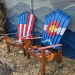 Set of two ski chairs, one painted with the American flag and one with the Colorado flag