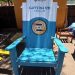 84 inch XXL Adirondack chair painted teal and white with a Ziggi's Coffee logo and cup shaped top