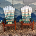 Two matching ski chairs with white snowfields, sage ridgelines and painted sunflower detail
